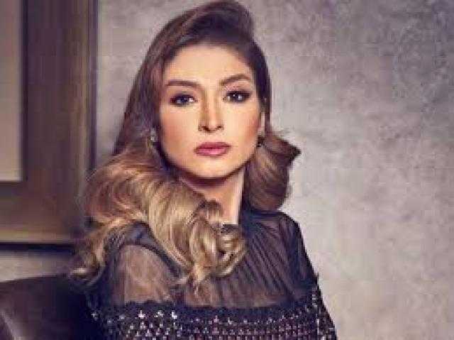 روجينا تبرز أنوثتها بالأحمر في أحدث جلسة تصوير