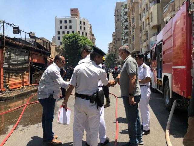 المعمل الجنائي يفحص الأدلة الجنائية لتحديد أسباب حريق منفذ التموين في الدقي