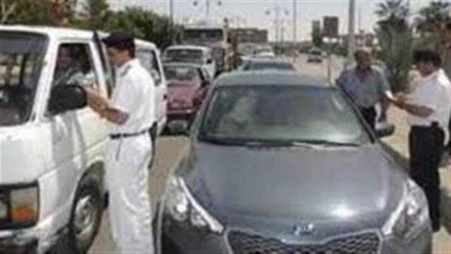 حملات مرورية لرصد مخالفات السيارات بمحاور القاهرة والجيزة