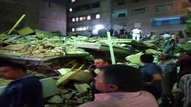 النيابة العامة تعاين موقع العقار المنهار بشبرا الخيمة