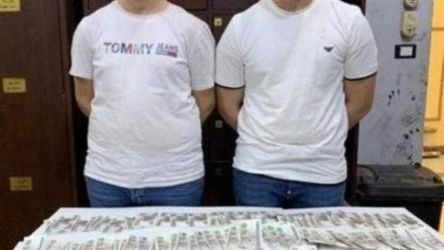 ضبط شخصين بتهمة ترويج أموال مزورة بالموسكي