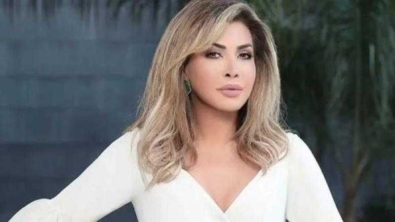 نوال الزغبي تبهر جمهورها بالأبيض وحبات الألماس