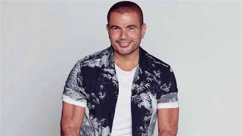 عمرو دياب الأعلى استماعا على أنغامي بـ ما تيجي نفك وسنجل