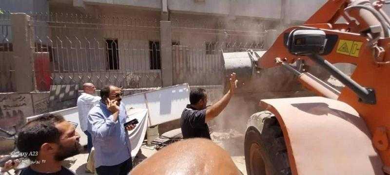 محافظة الجيزة تزيل عددا من المخلفات بمنطقة بولاق الدكرور